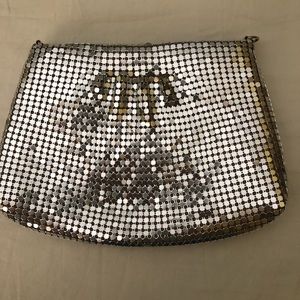 Women’s silver metallic evening bag
